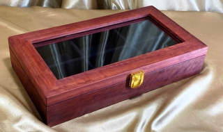 Custom Made Jarrah Display Case with Glass Lid to display a collection of buckles 
